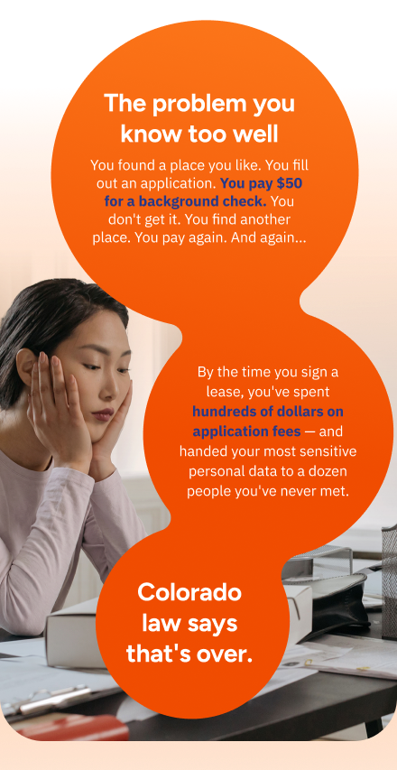 A renter at a desk among paperwork and a printer