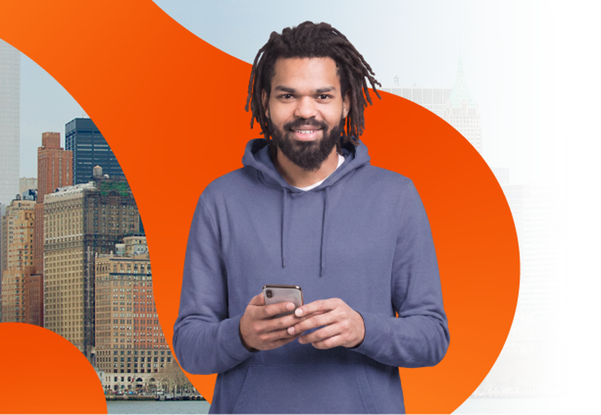 New York skyline with a renter holding a phone