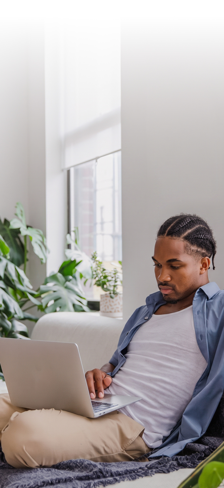 A renter at her desk, frustrated by application fees