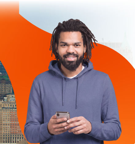 New York skyline with a renter holding a phone