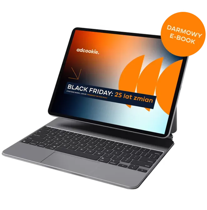 Tablet z klawiaturą, ekran pokazuje grafikę Black Friday i napis Darmowy e-book.