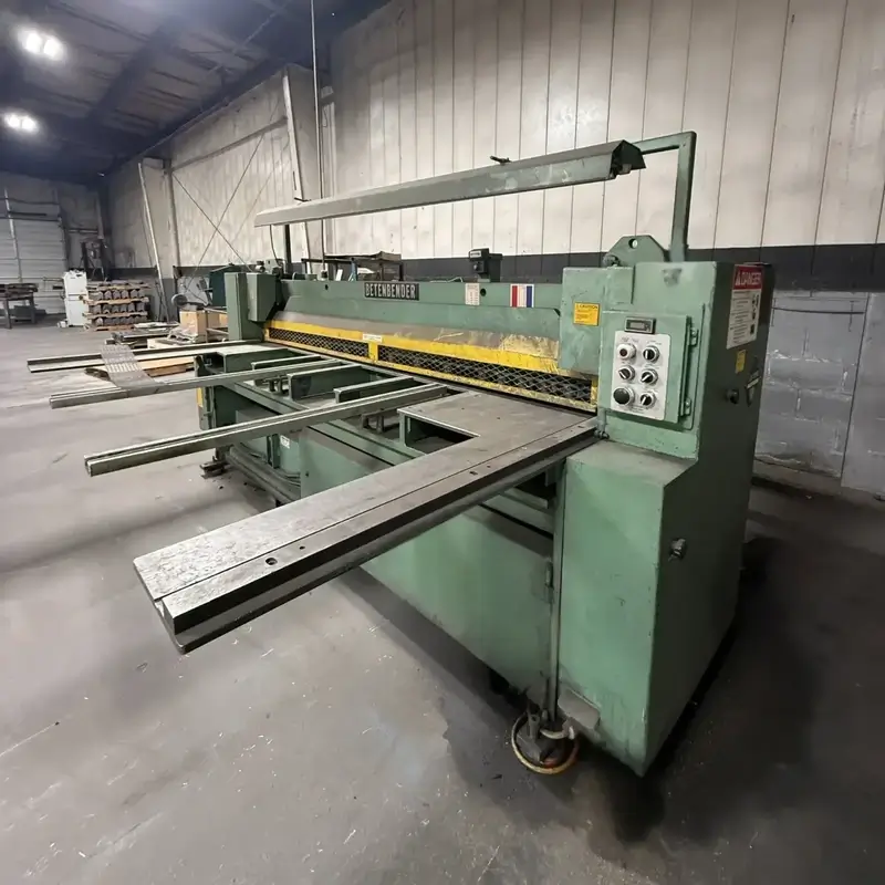 Large green industrial KMT C316 Cold Saw machine inside a spacious warehouse.