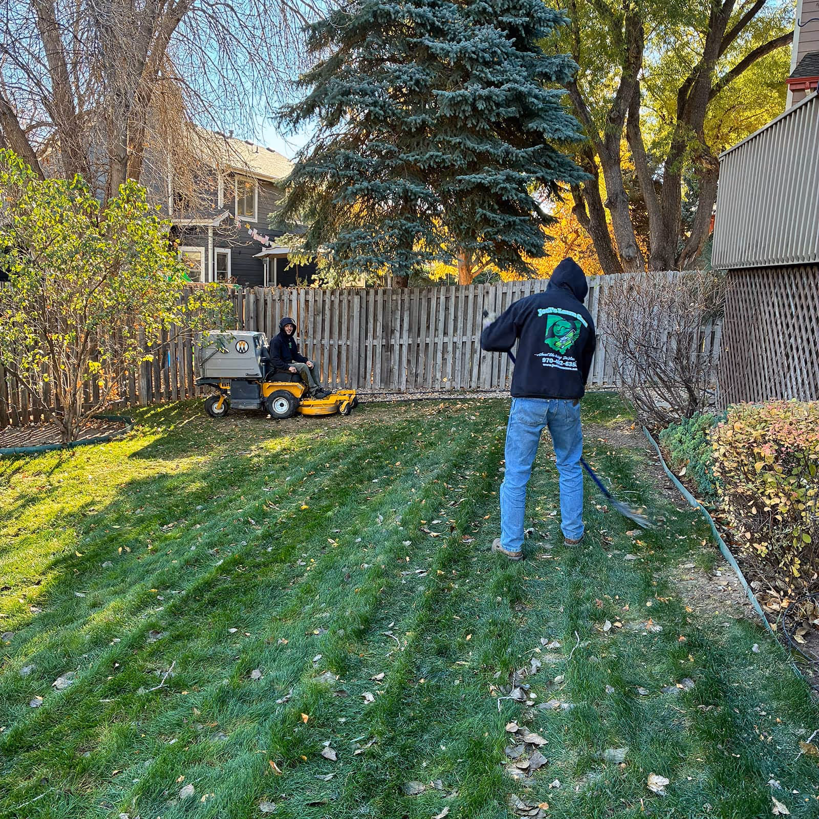 Seasonal yard cleanup with leaf removal and landscape care
