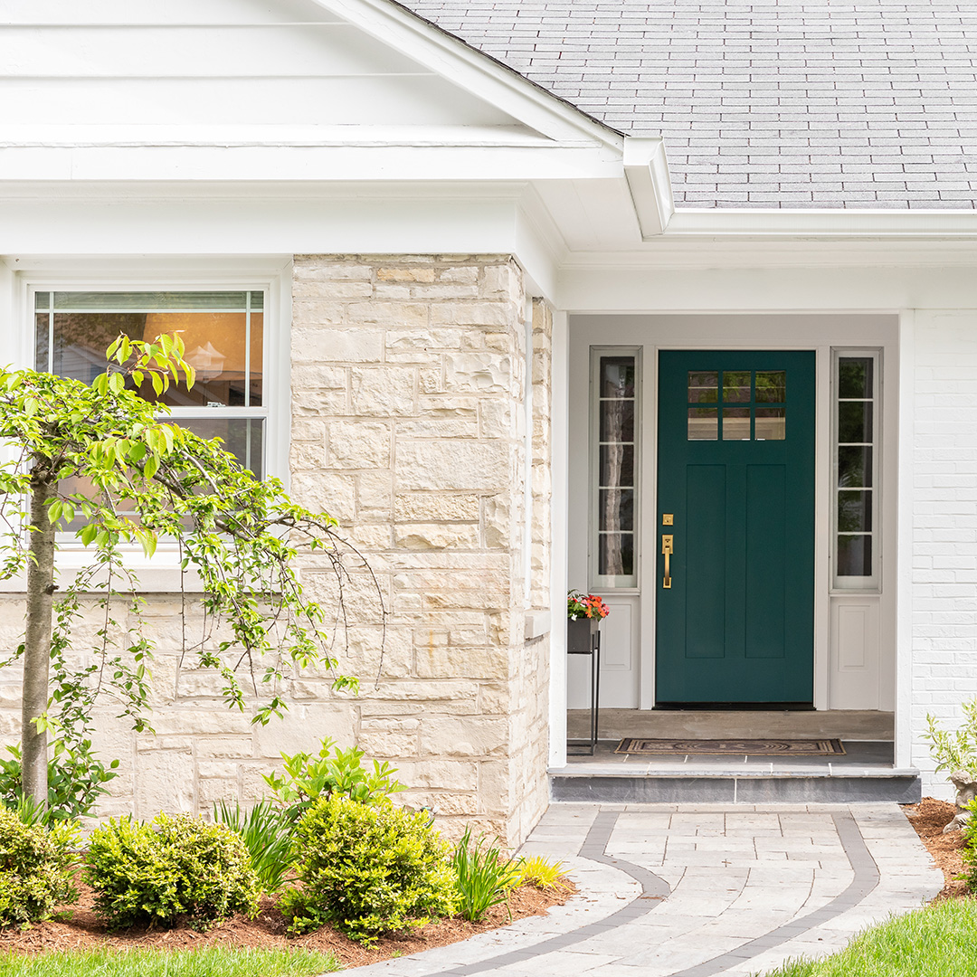 Landscaping work improving curb appeal on residential property in Timnath