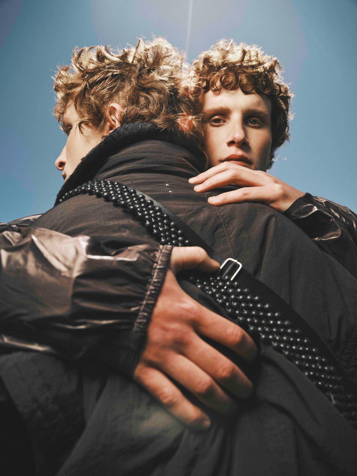 Cinematic still from RESH commercial film — close-up portrait with dramatic lighting