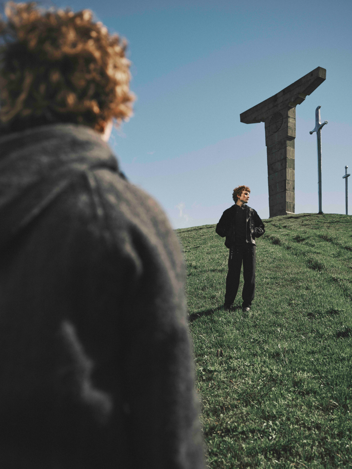 Cinematic still from RESH fashion campaign — wide frame with model