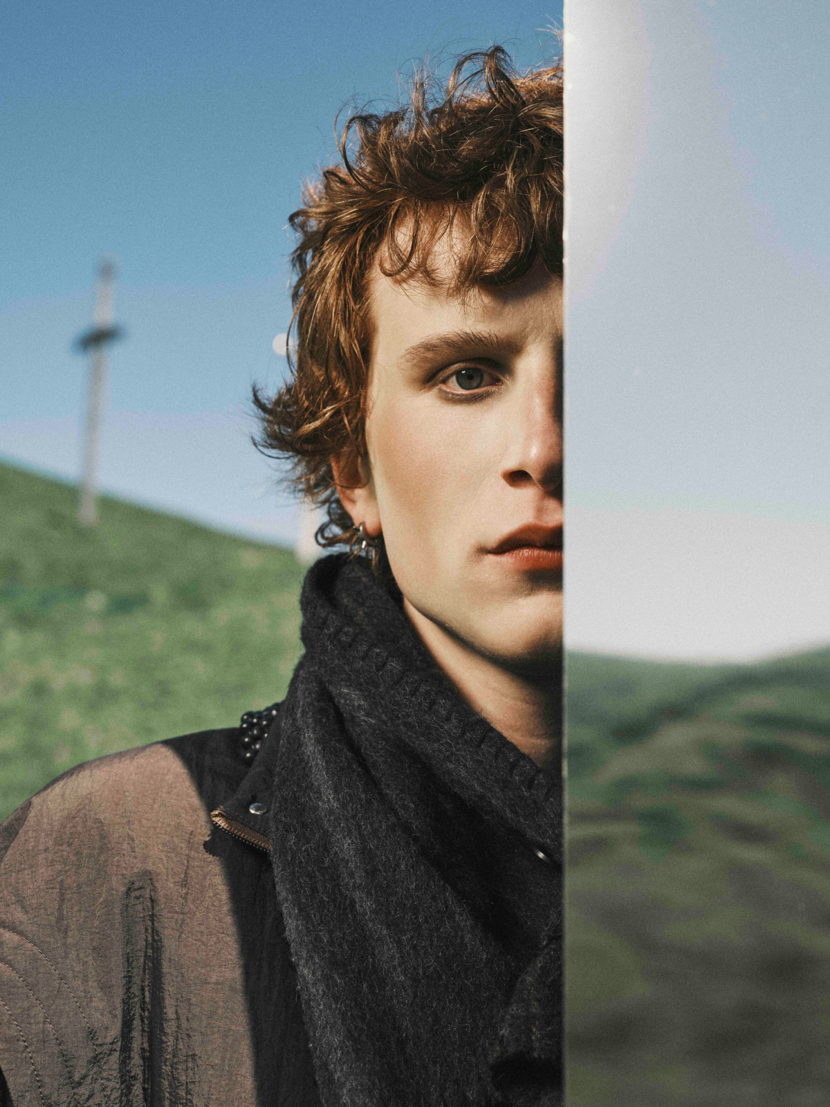 Cinematic still from RESH commercial film — close-up portrait with dramatic lightingCinematic still from RESH fashion campaign — wide frame with model