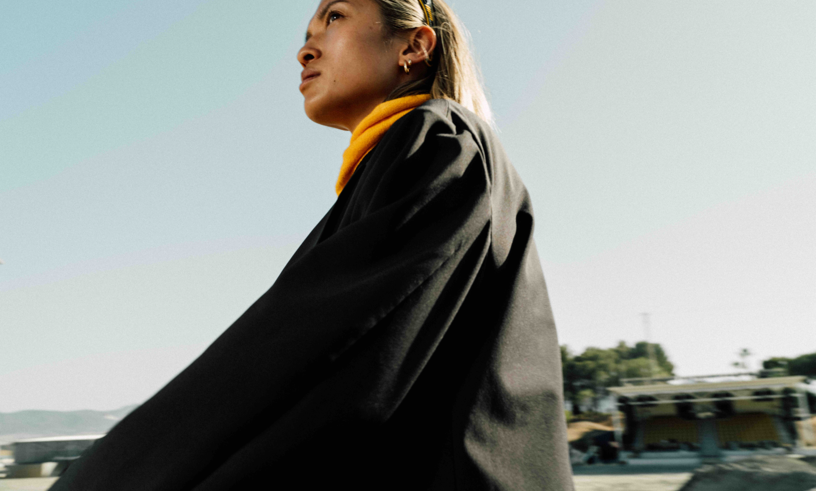 Cinematic still from RESH commercial film — close-up portrait with dramatic lighting