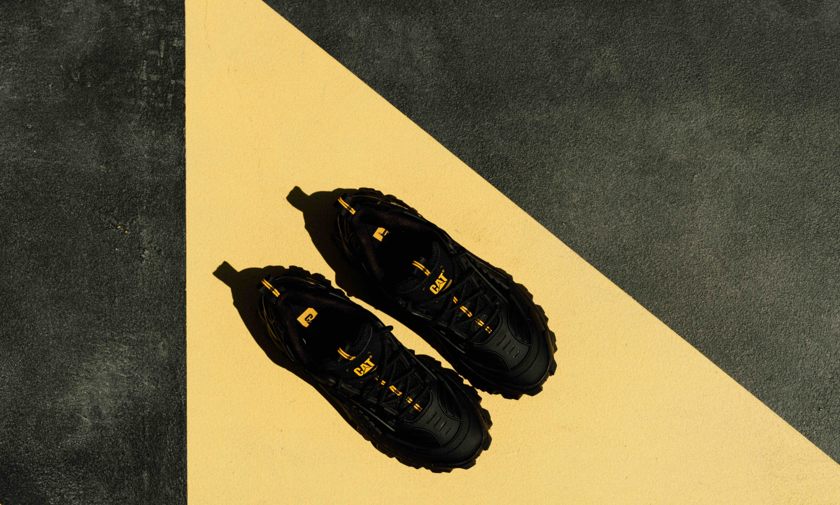 Cinematic still from RESH CAT Footwear commercial film — close-up portrait with footwear