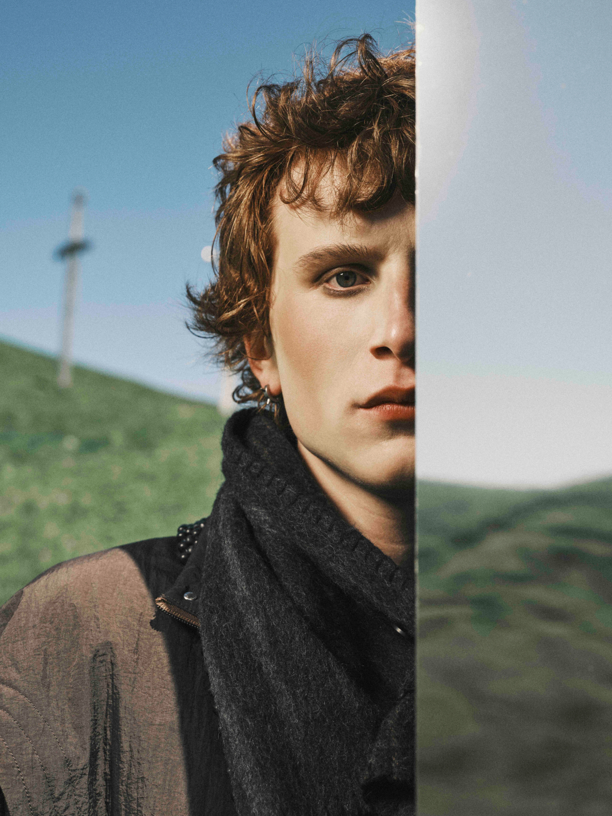 Cinematic still from RESH fashion campaign — wide frame with model