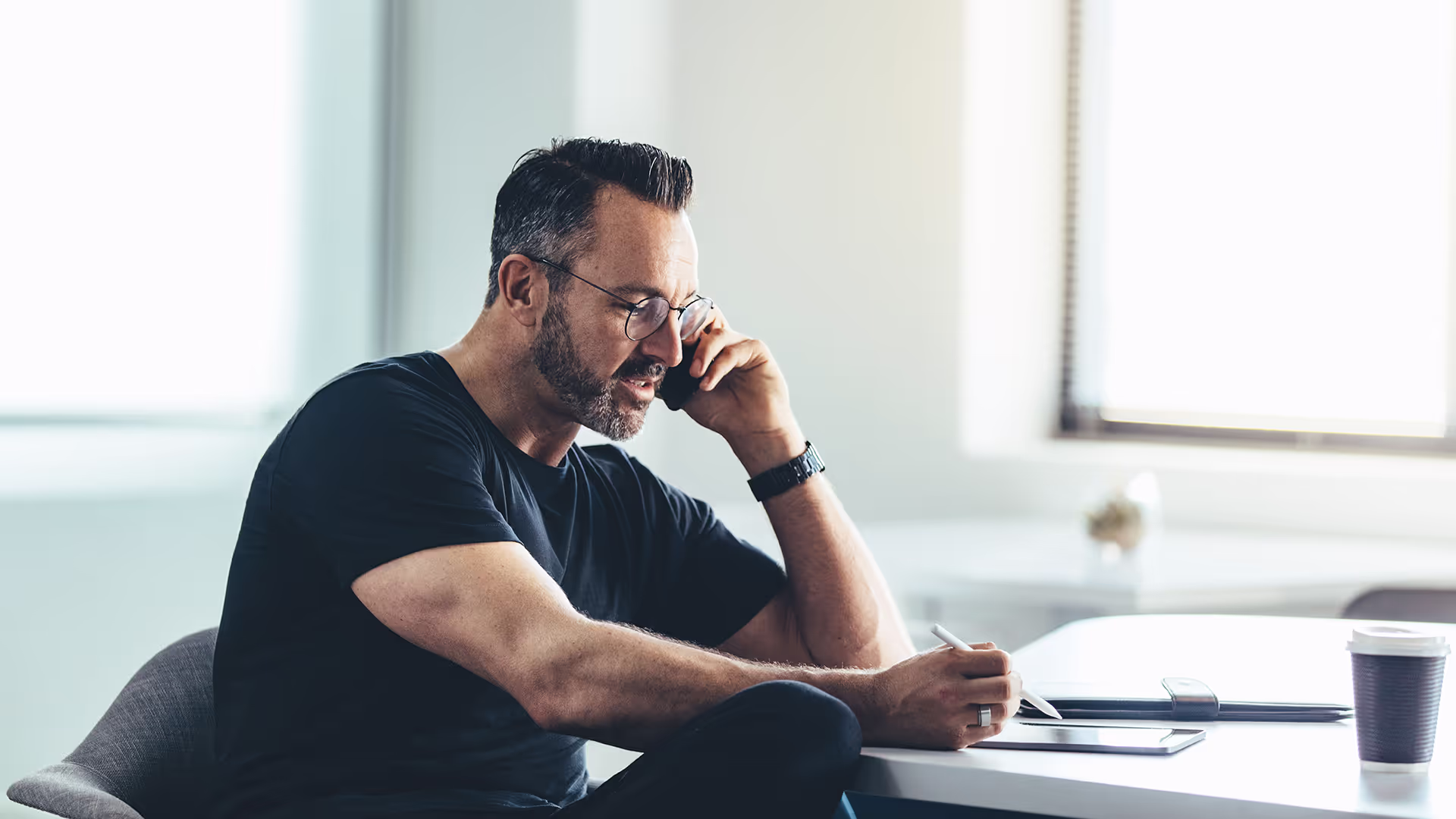 A men talking on the phone.