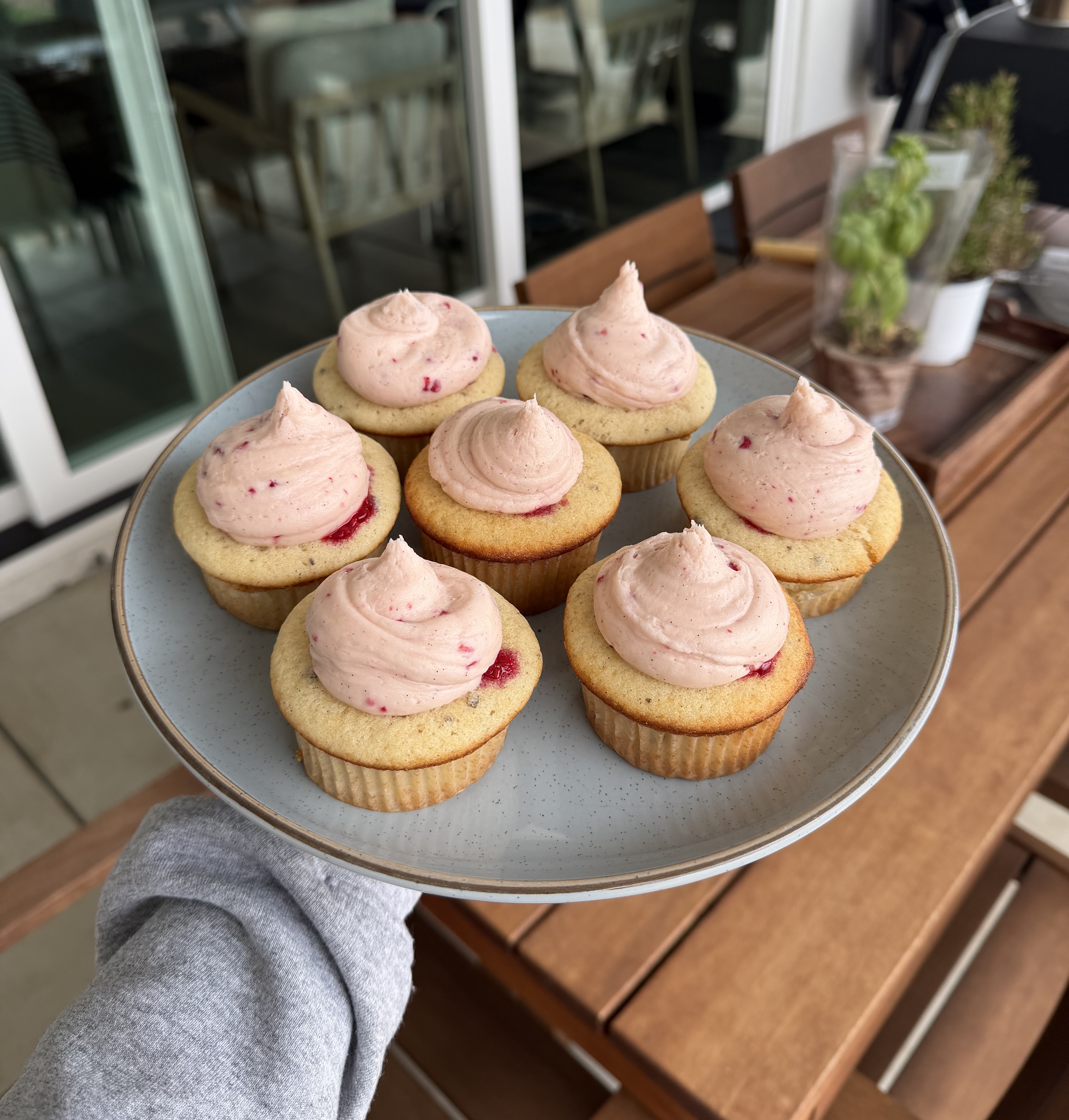 Vanilla Cupcakes with Speckled Raspberry Frosting