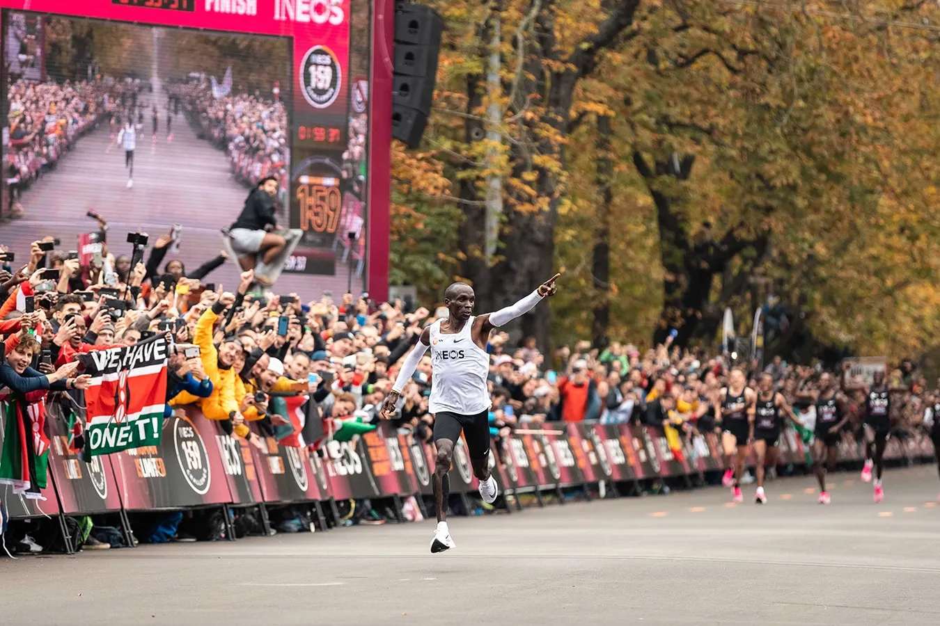 Eliud Kipchoge making history in 2019 by breaking the two-hour barrier at the INEOS 1:59 Challenge, finishing in 1:59:40.