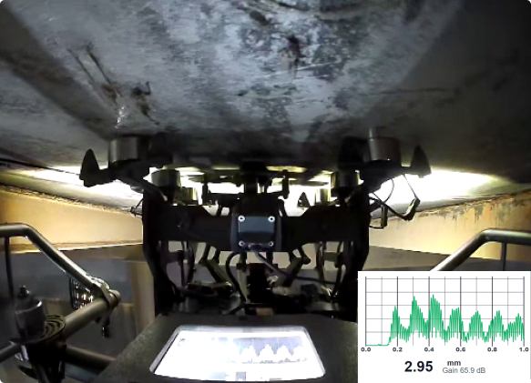 Close-up of Avestec SKYRON2 camera with a large lens mounted on a stabilizing rig with LED lights.