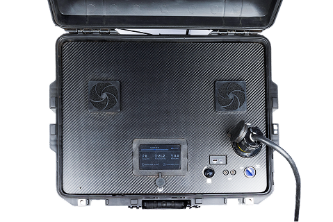 Black rugged case with a touchscreen, ventilation fans, control knobs, and a connected cable.