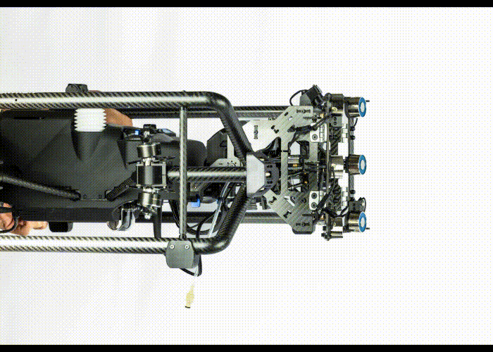Mechanical arm rotating forward and backward inside a carbon fiber frame.