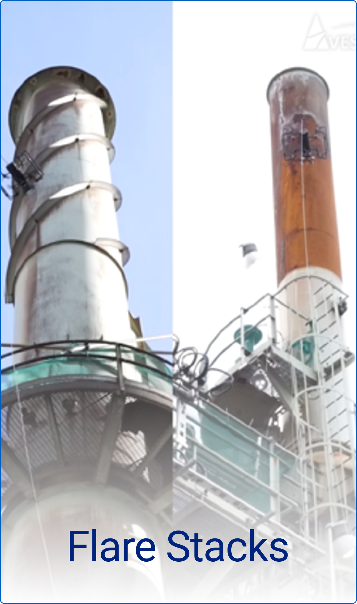 Two industrial flare stacks with metal platforms and ladders against a clear sky.