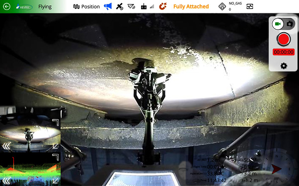 Onboard camera view showing SKYRON2 probe attached under the wing with various flight data overlays.