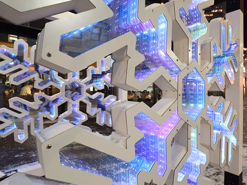 close up of a custom built snowflake with 2 way mirrors and LED-lights