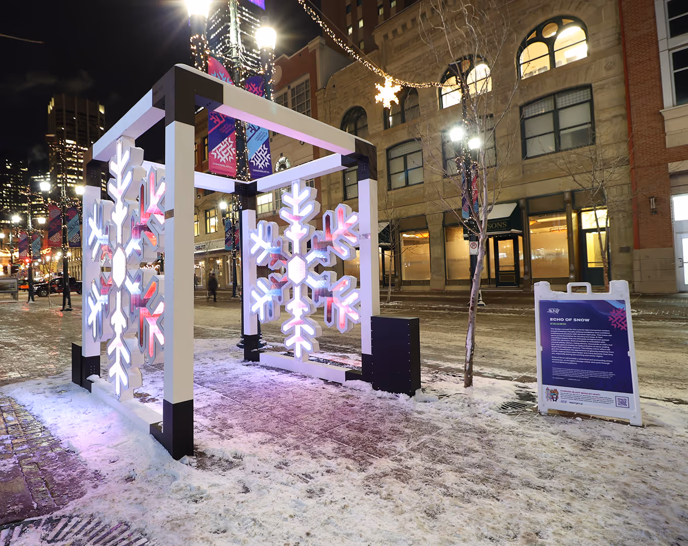 outdoor winter pergola featuring custom-built LED and two way mirror snowflakes