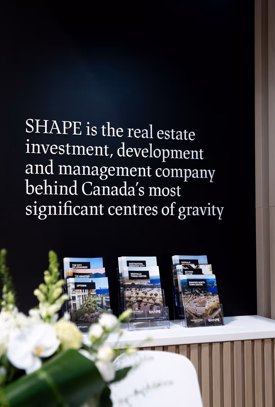 custom 3D letters displaying a mission statement on a trade show exhibit wall