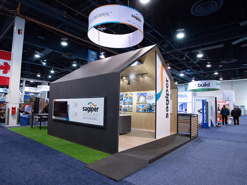 custom island 20x30 trade show booth that looks like an open-ended home structure