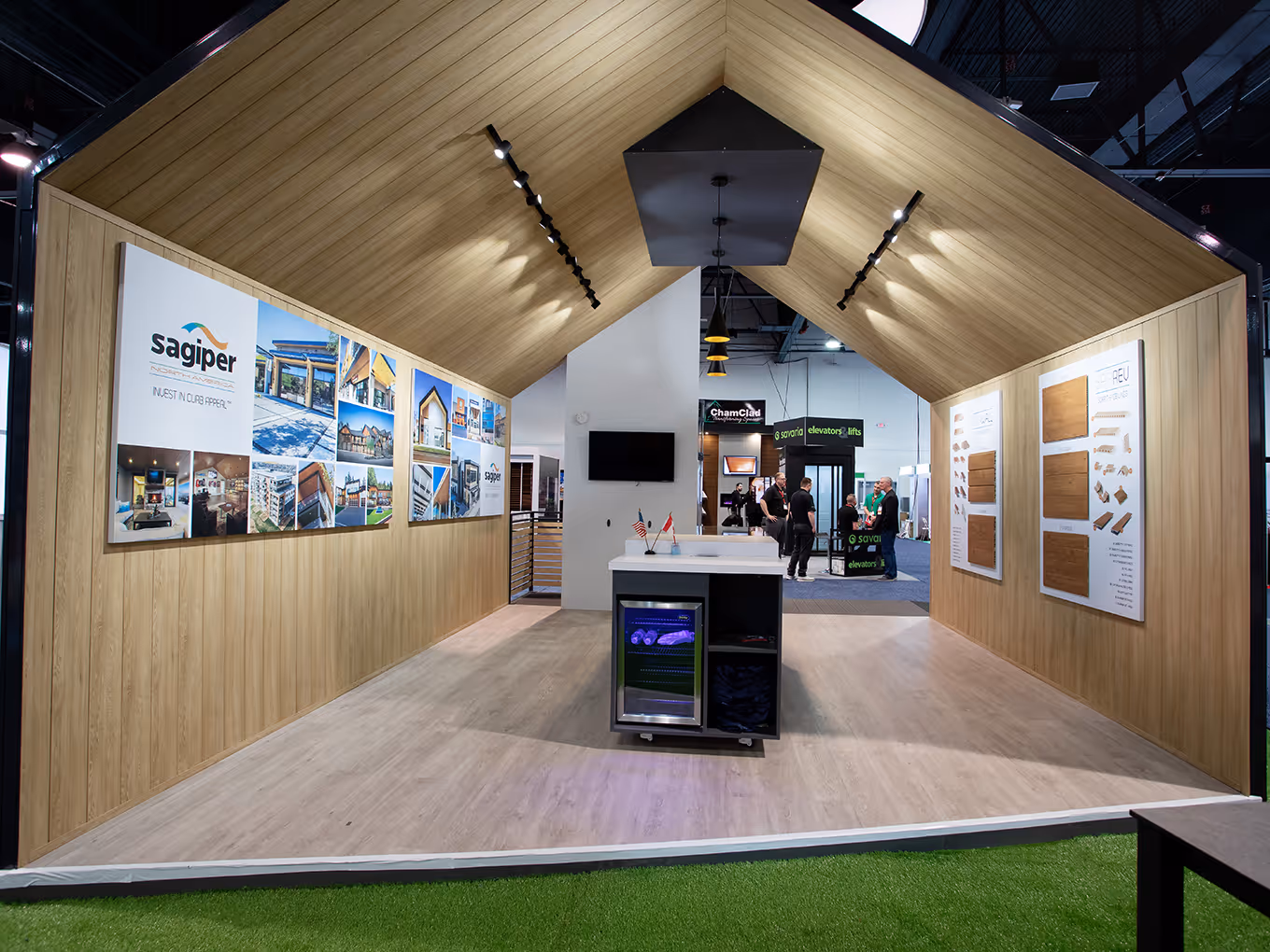 interior of a covered walk-through custom trade show exhibit for a cladding manufacturer