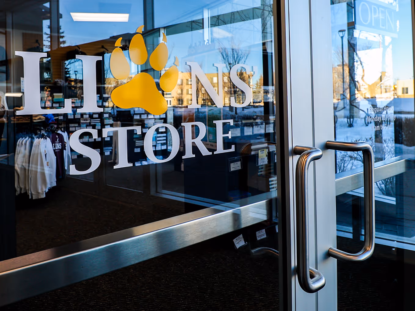 close up vinyl graphic logo applied to a glass door