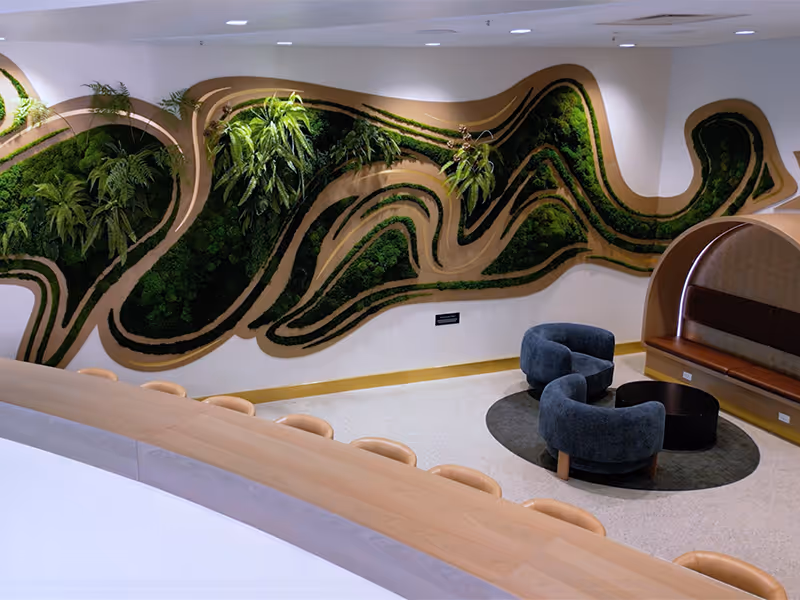 moss wall art installation in a downtown Calgary lobby featuring custom millwork