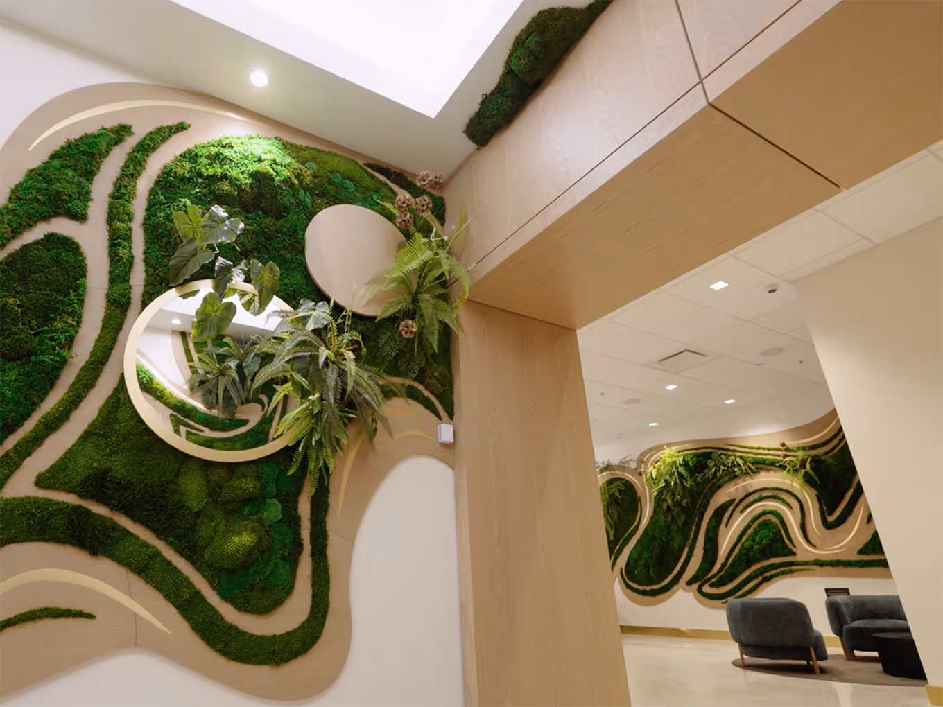 close up of a corporate entry wall with a custom-built abstract greenery wall