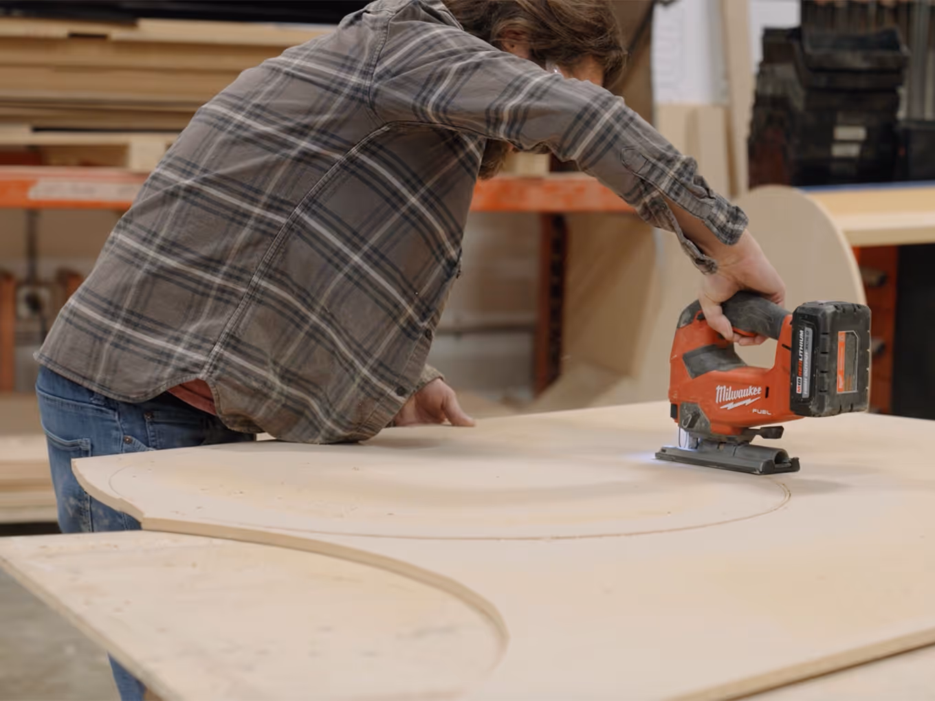 fabricator producing custom millwork for a corporate wall display in calgary