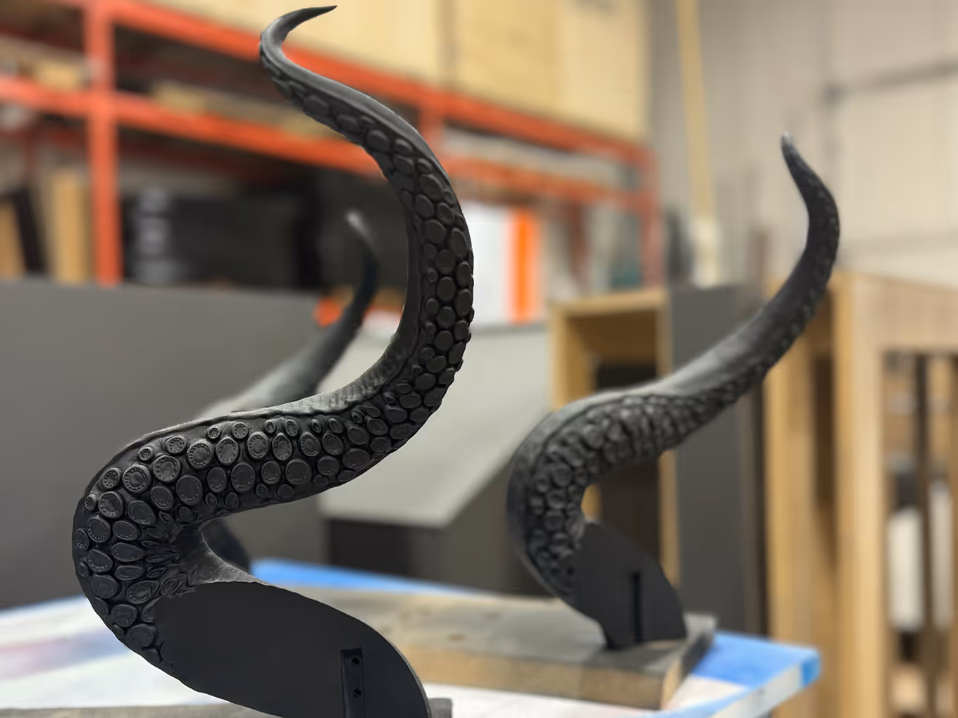 Custom 3D printed tentacles design to wrap around a Rum bottle for a marketing display.