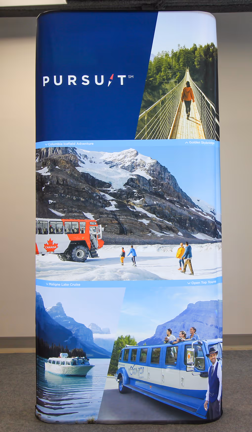 Vertical Pursuit fabric display showing four attraction photos with the Pursuit logo at the top.