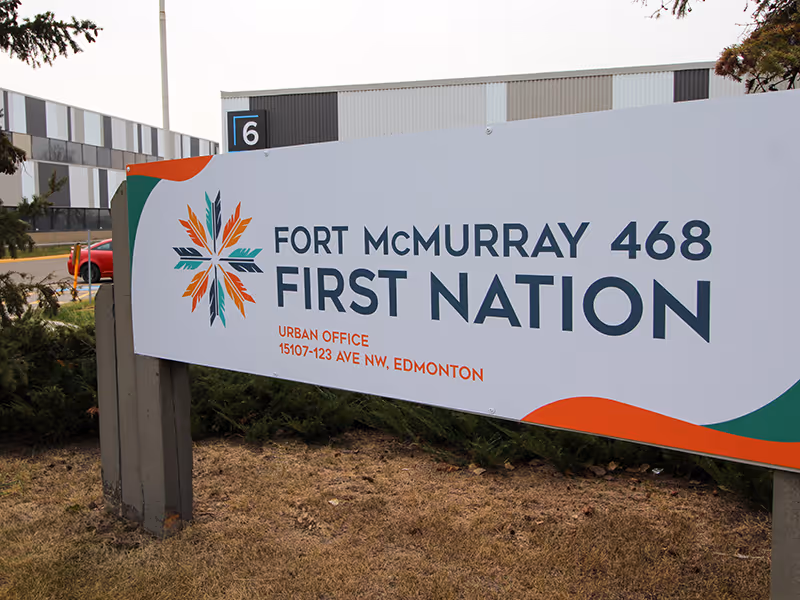 Roadside Fort McMurray 468 First Nation sign printed on ACM, showcasing logo and Edmonton urban office address.
