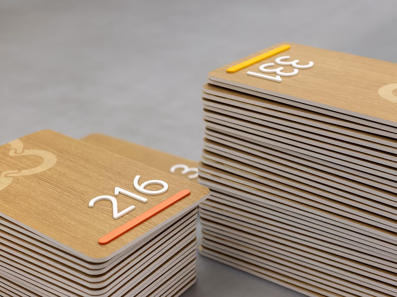 Close-up of multiple layered material signage being constructed.