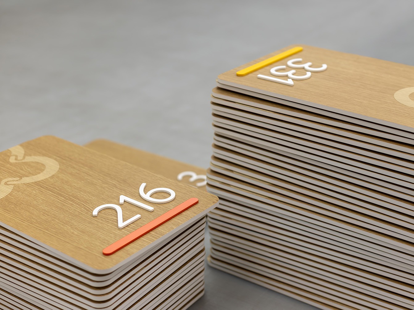 Close-up of multiple layered material signage being constructed.