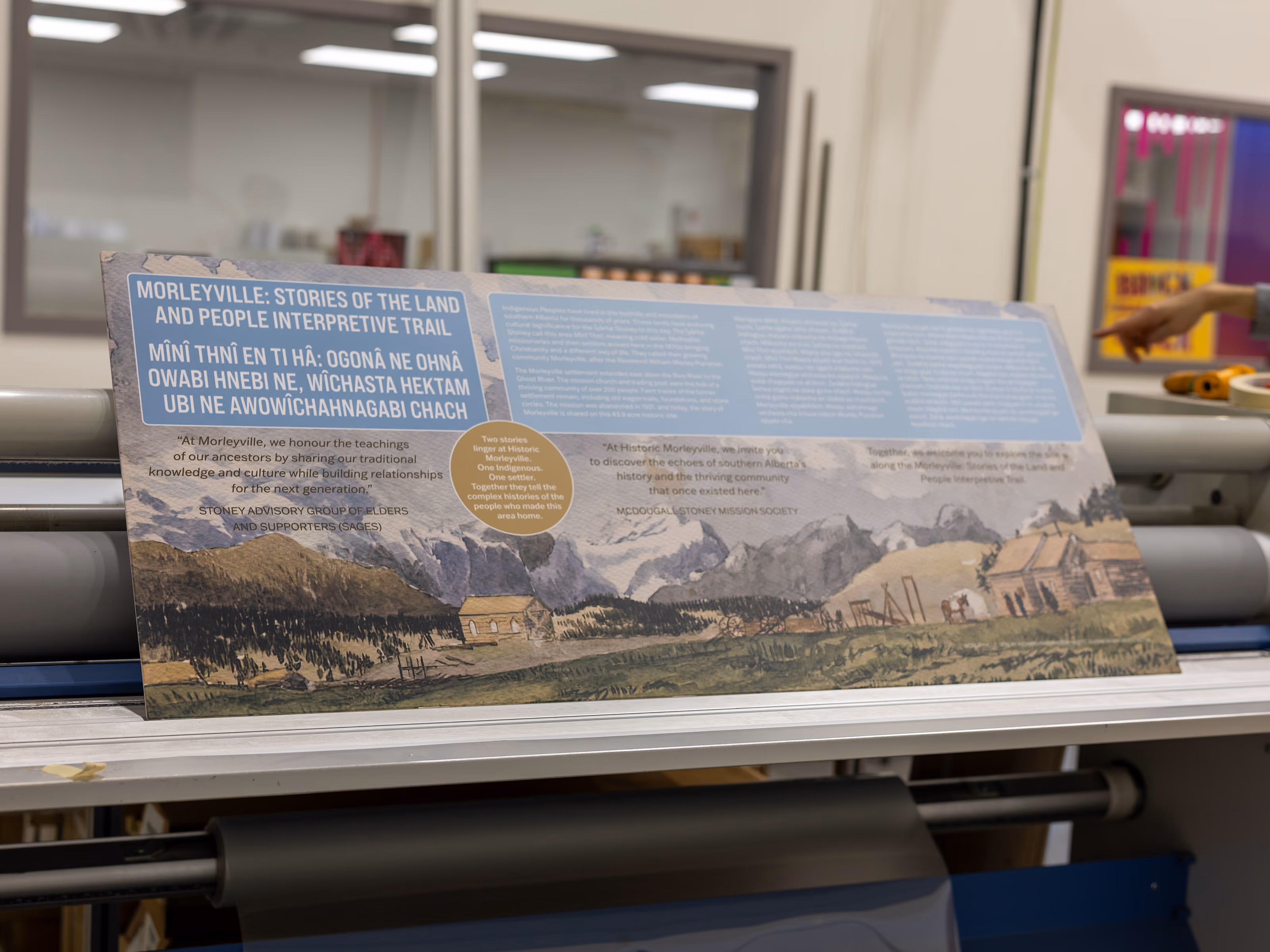 Interpretive trail panel on the print production table during large-format dye-sublimation printing.
