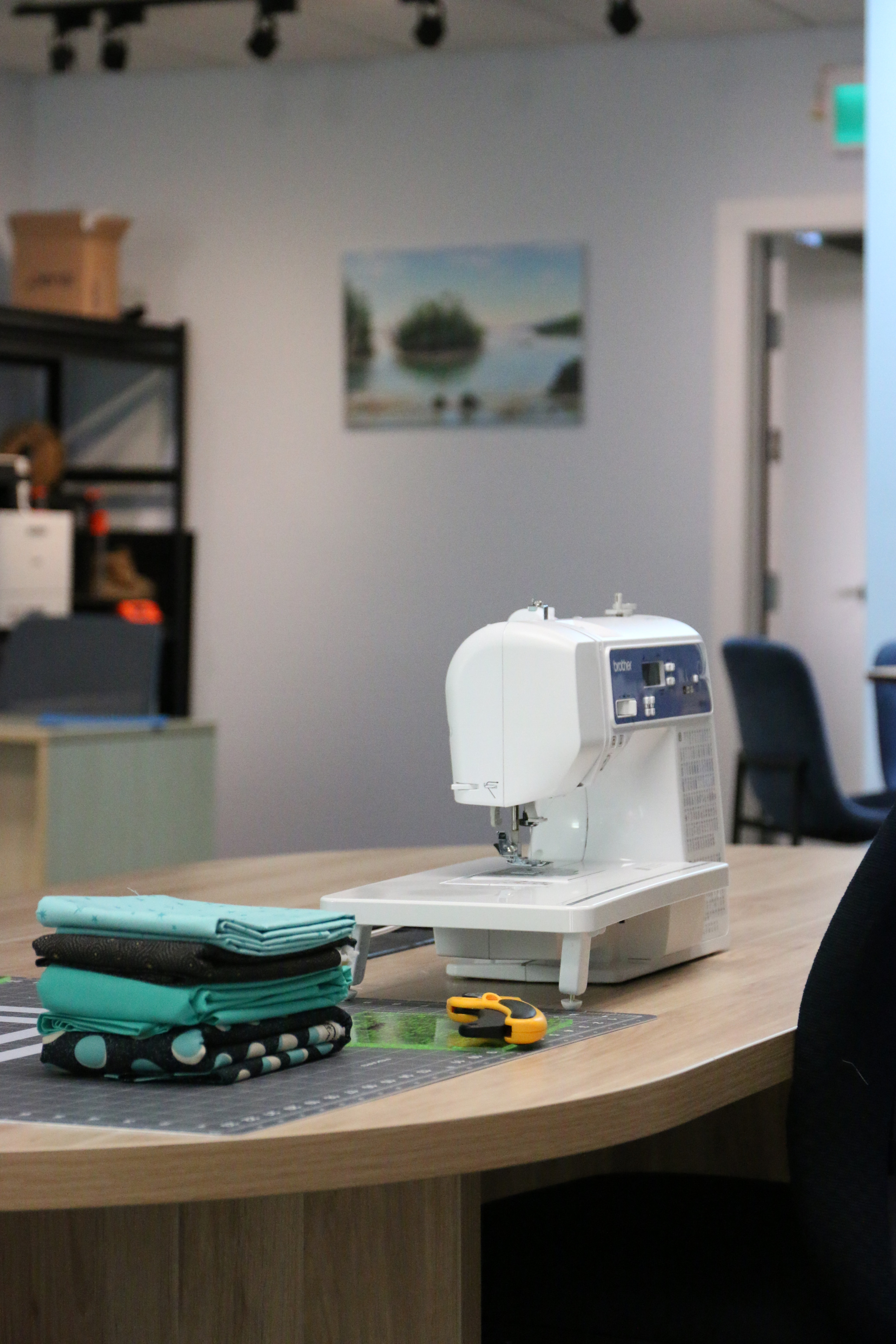 Photography of Sewing Machine in Organized Office