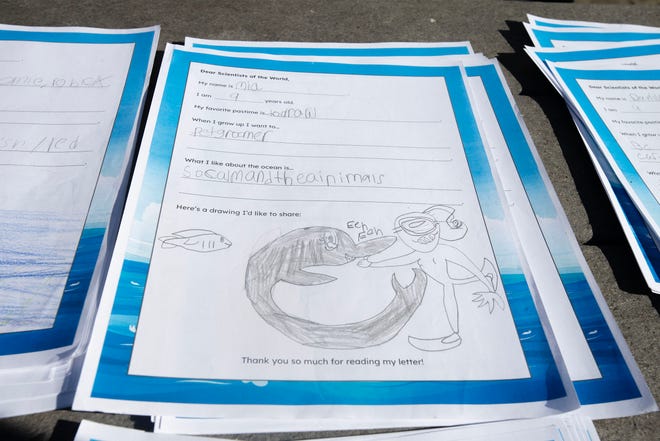 Letters from New Jersey fourth graders written about the Sentinel Mission that will send an underwater glider circling world's oceans collecting data. Rutgers University students went out into classrooms teaching about the mission, collected the letters and digitized them. They will be carried onboard the Redwing glider. The letters will be printed and shown to local school children at the glider's 7 ports of call. Photo taken on Oct. 10, 2025