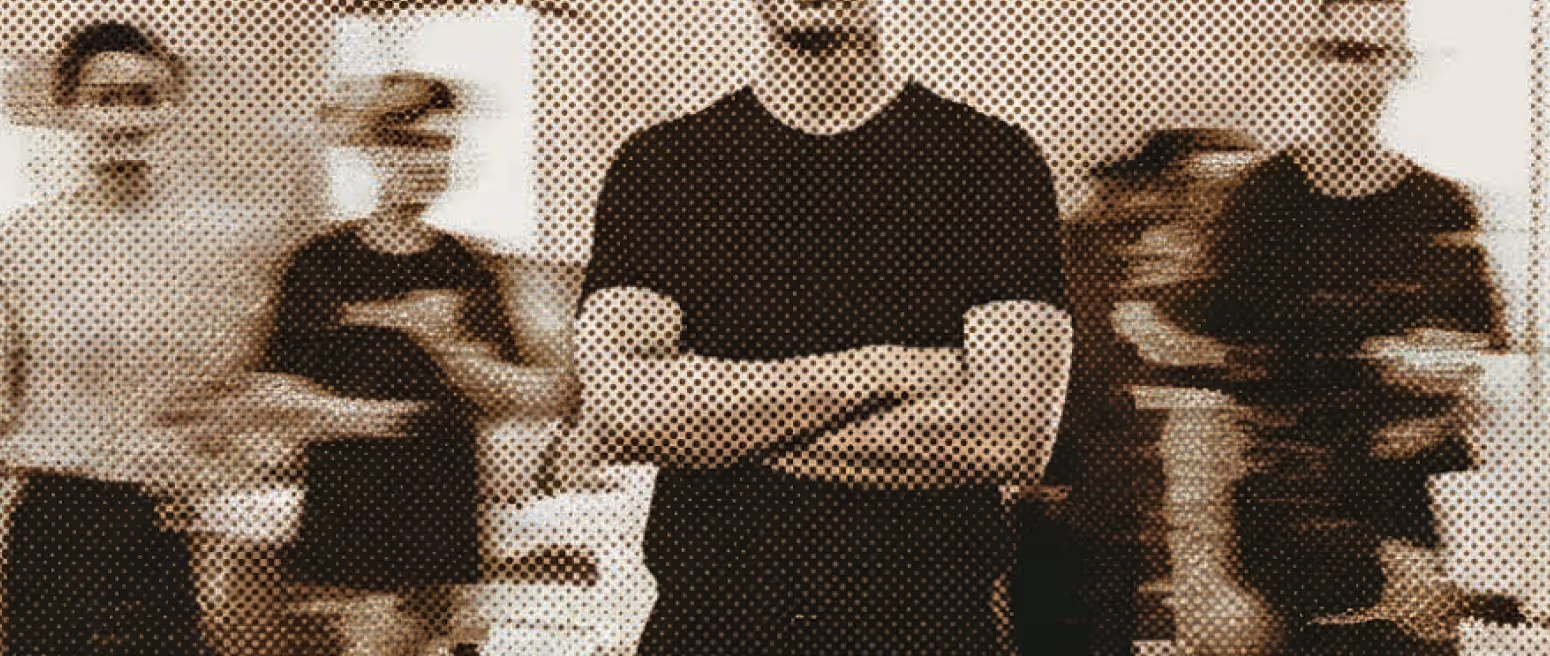 Artistic image of five people with blurred faces and bodies, with the person in the center standing with crossed arms.