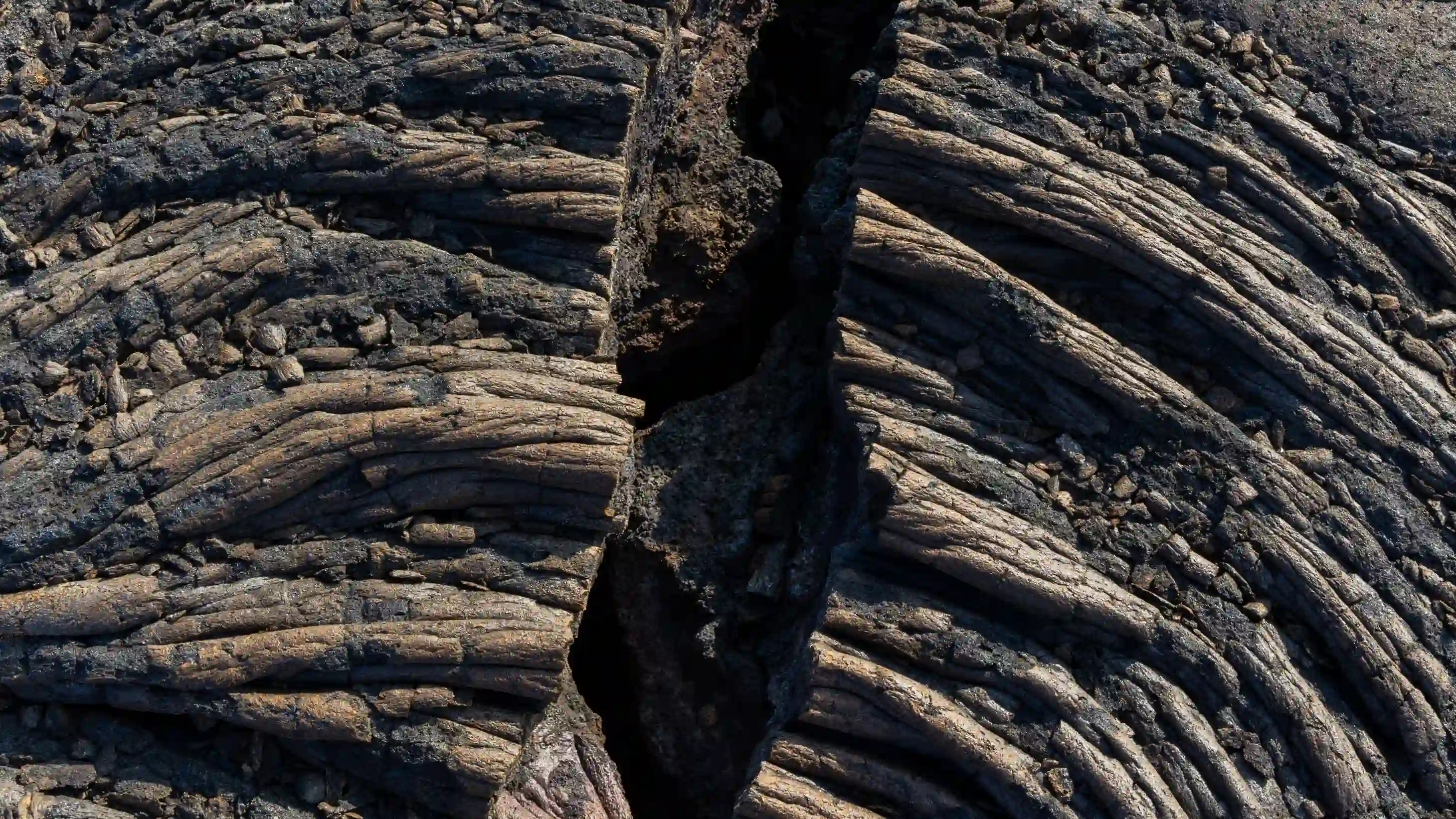 A cract in pahoehoe lava shot by Alan Ohara