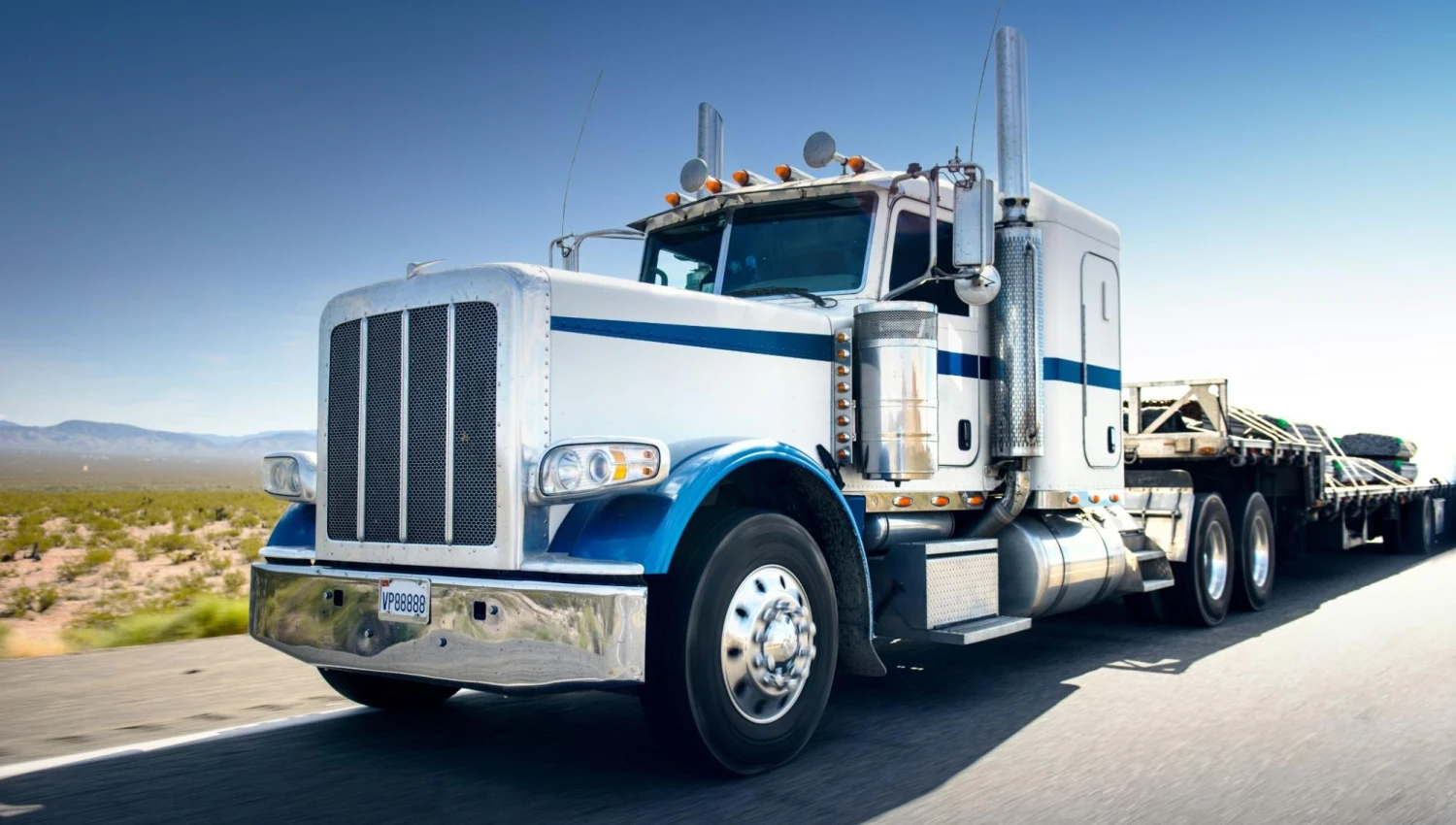 A truck on the side of a road