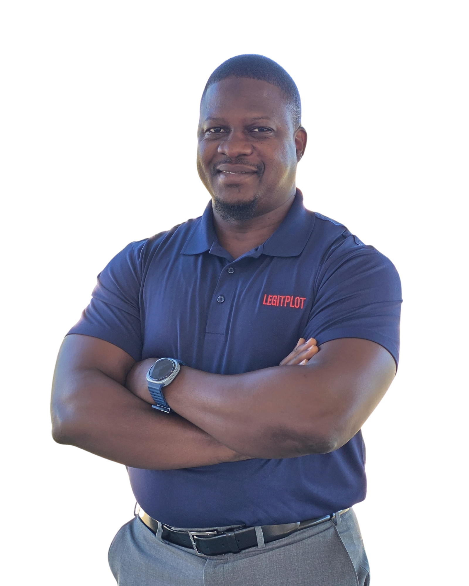 Nasser Muzaaya, founder of LegitPlot, wearing a LegitPlot polo shirt with his arms crossed.