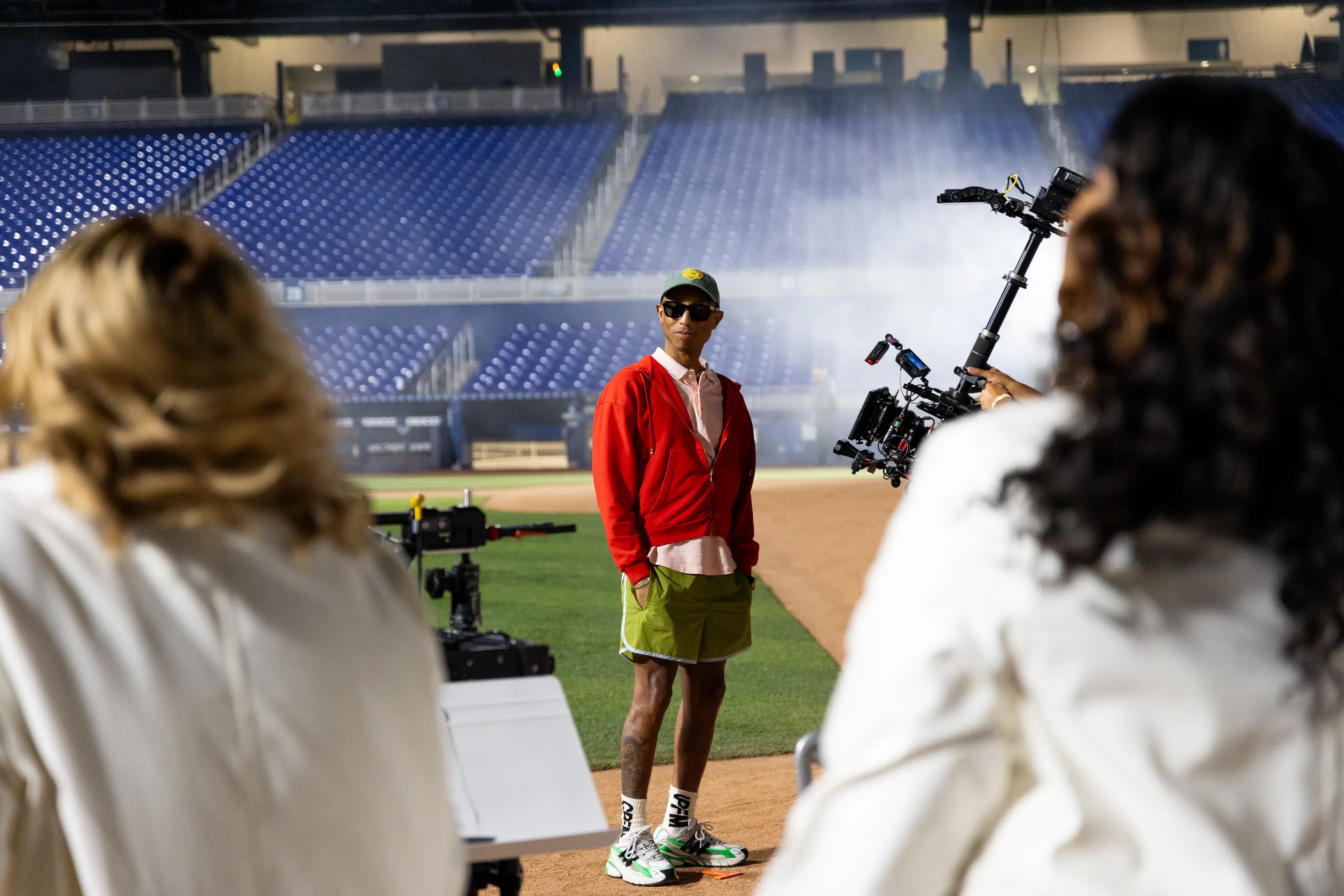 Pharrell Williams conducting Voices of Fire choir at MLB Playoffs – photo by So & So Productions