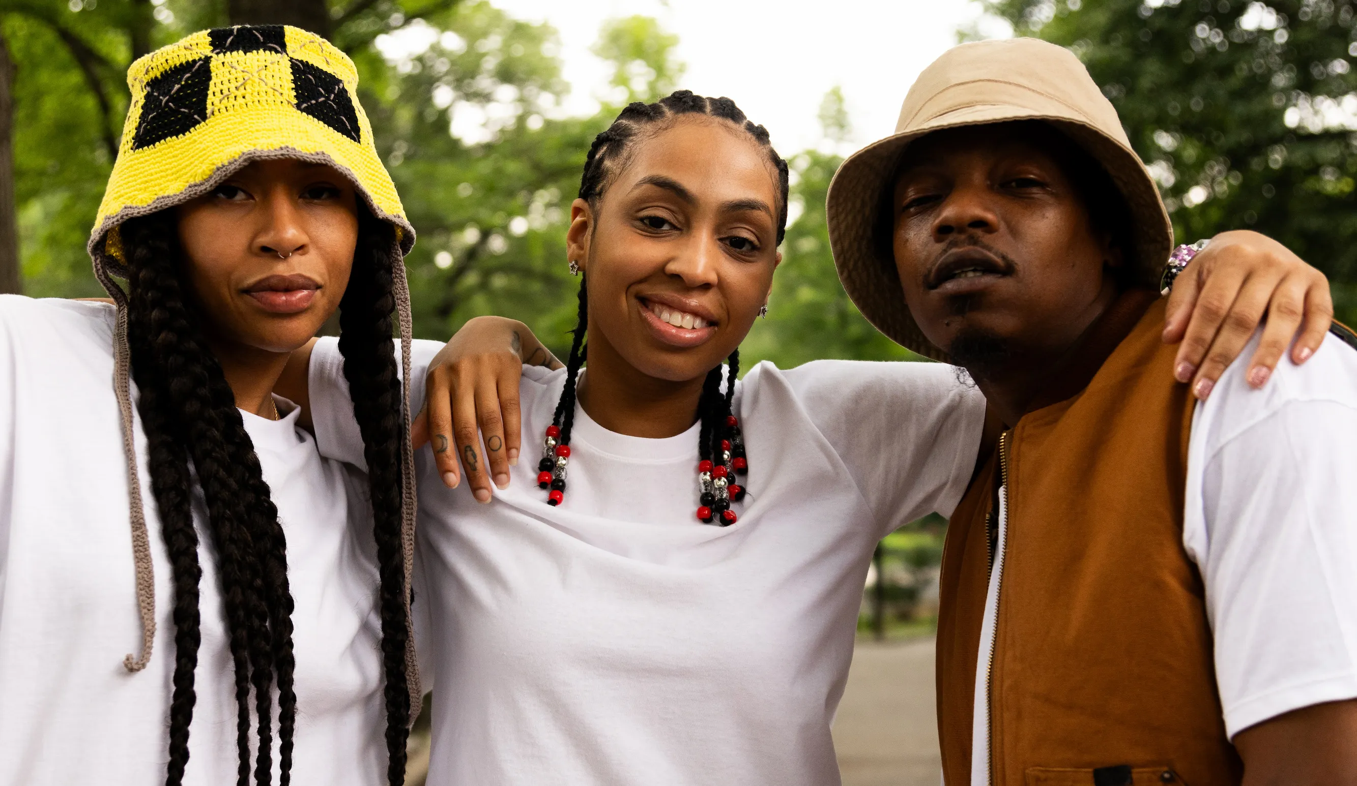 Group photo featuring artists wearing Hanes white tees for hip-hop culture tribute — So & So Productions