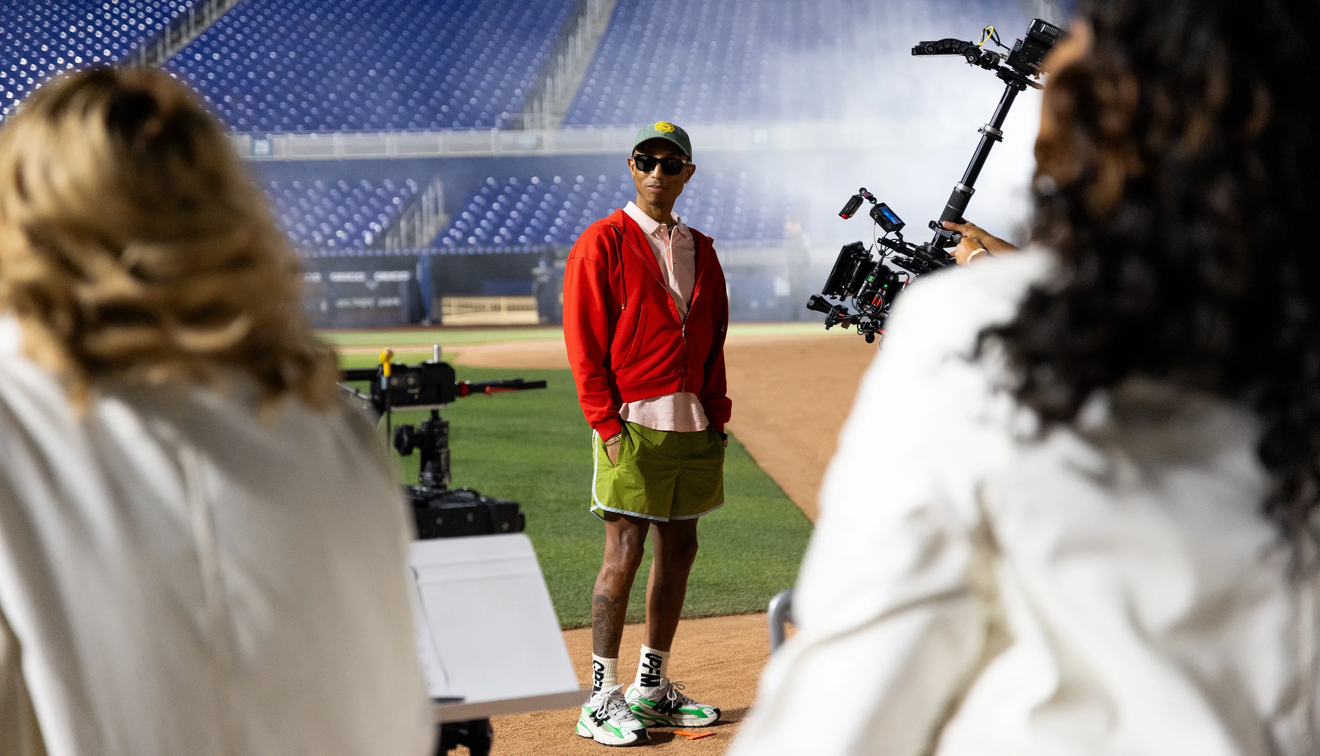 Pharrell Williams conducting Voices of Fire choir at MLB Playoffs – photo by So & So Productions