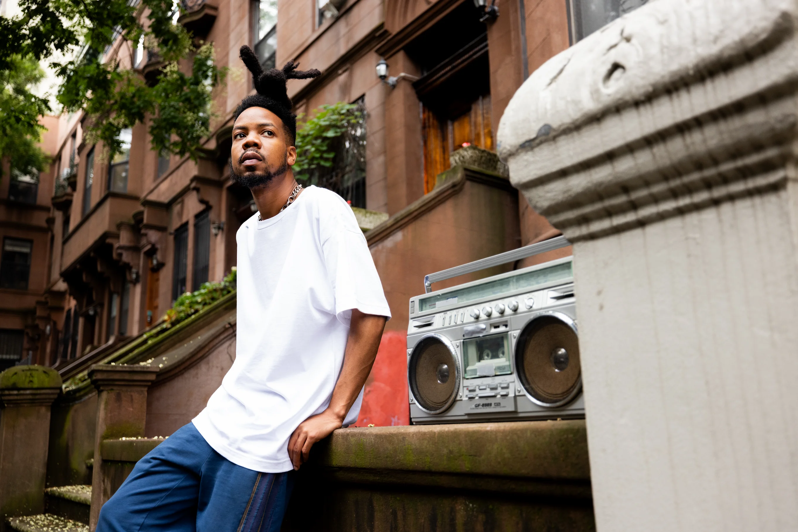 Vintage-inspired photo of Hanes white tee styled with chains and boom-box for Hip-Hop 50 celebration — So & So Productions