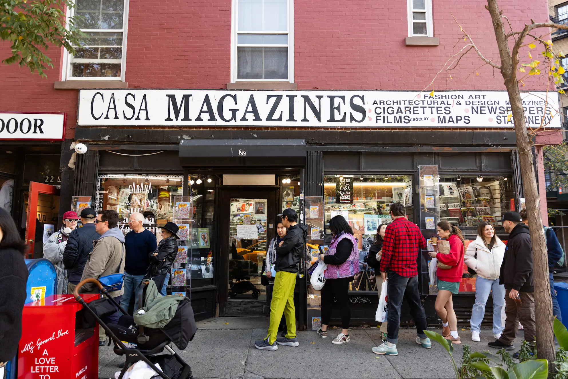 Fans waiting in line outside Casa Magazines for New York Nico meet-and-greet — So & So Productions event photography.
