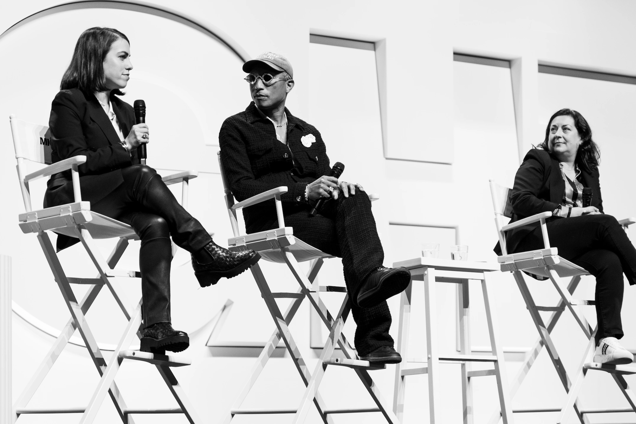 Conference panel discussion at Mighty Dream Forum focused on entrepreneurship and equity — So & So Productions photo.