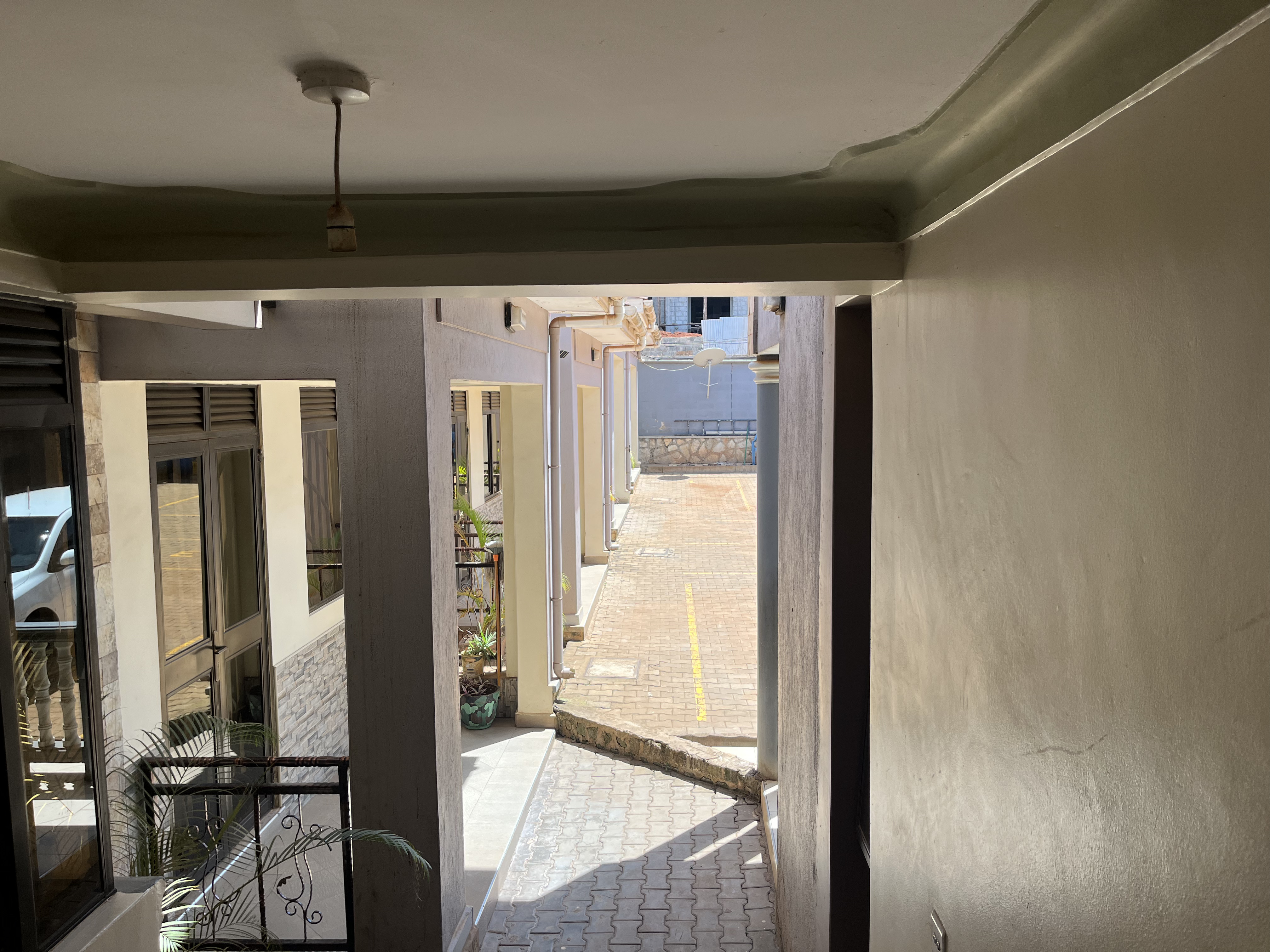 Exterior view of modern apartment investment property built in 2018 in Wakiso Uganda